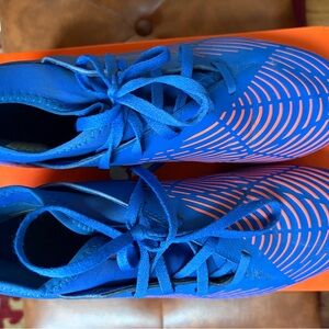 Adidas Blue Athletic soccer cleats with Orange Accents